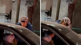 Ciclista es captado actuando de forma violenta contra un hombre y su automóvil