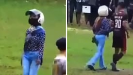 VIDEO| Mujer se lleva a su novio en pleno partido de futbol y se viraliza