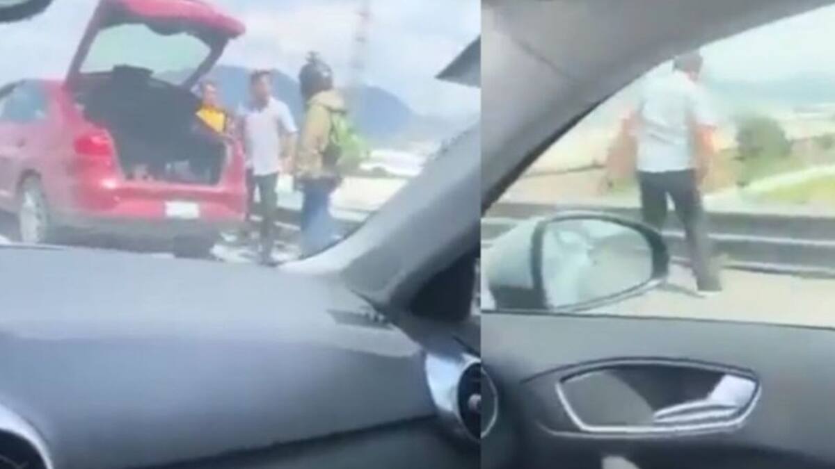 VIDEO | ¡Horrible! Conductor arrojó de lo más alto de un puente a un motociclista