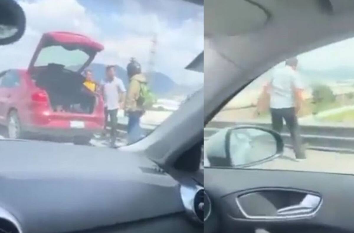VIDEO | ¡Horrible! Conductor arrojó de lo más alto de un puente a un motociclista