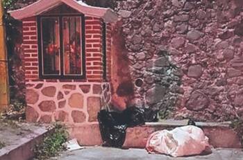 Aparece cuerpo de hombre dentro de bolsas en altar de la Virgen, en Morelos