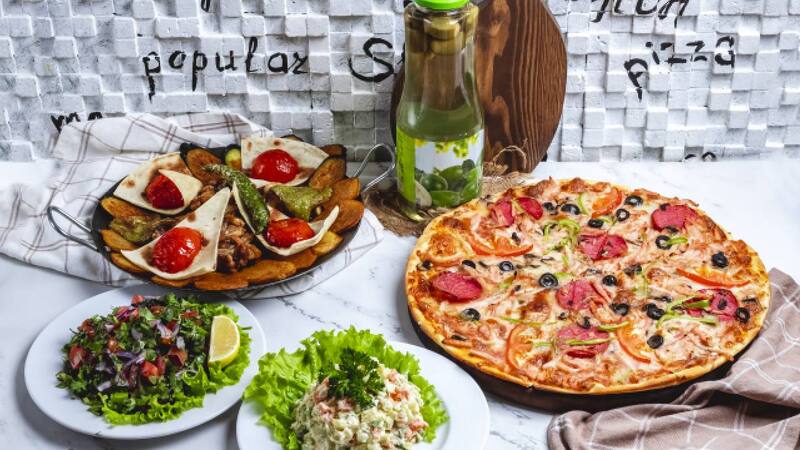 Un estudio científico comprobó que los ingredientes de la pizza disminuyen el dolor (Foto: Freepik)