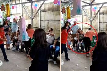 ¡No le atinó! Niño golpea a mujer en vez de la piñata y se hace viral| VIDEO