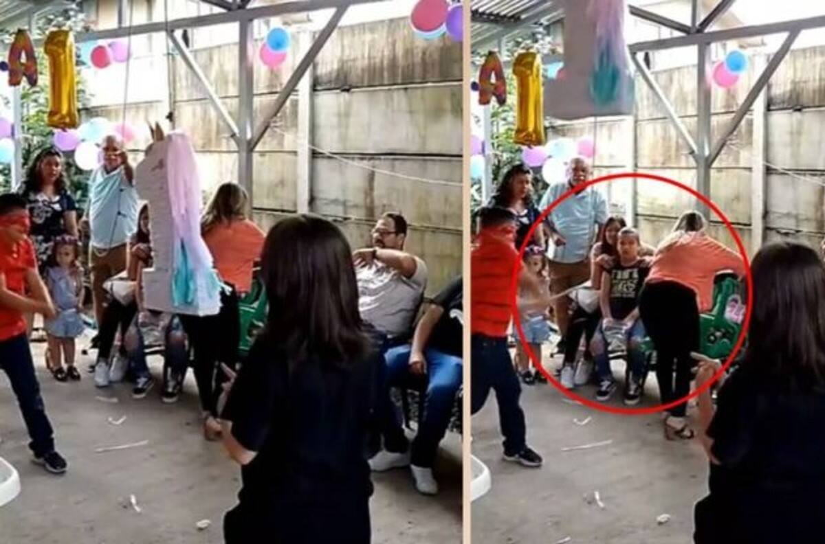 ¡No le atinó! Niño golpea a mujer en vez de la piñata y se hace viral| VIDEO