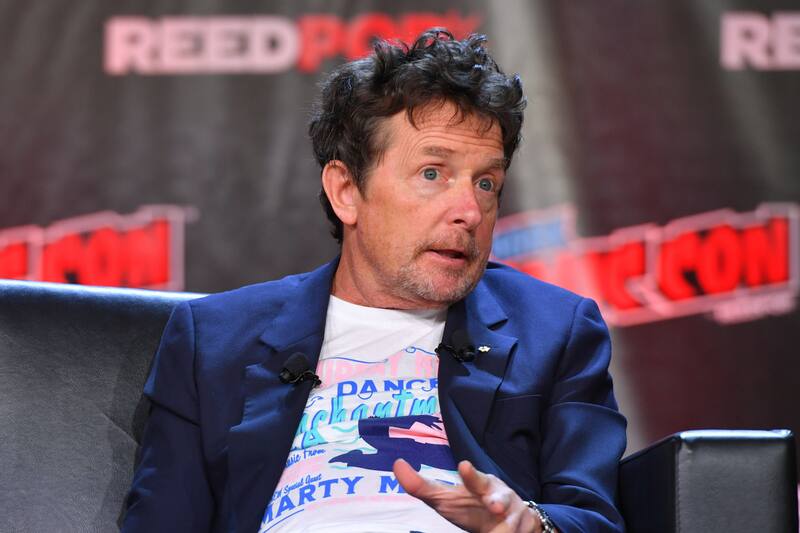 Actor Michael J. Fox attend the 'Back to the Future Reunion' at New York Comic Con on October 8, 2022 in New York.