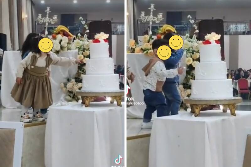 Niños se comen el pastel de boda.